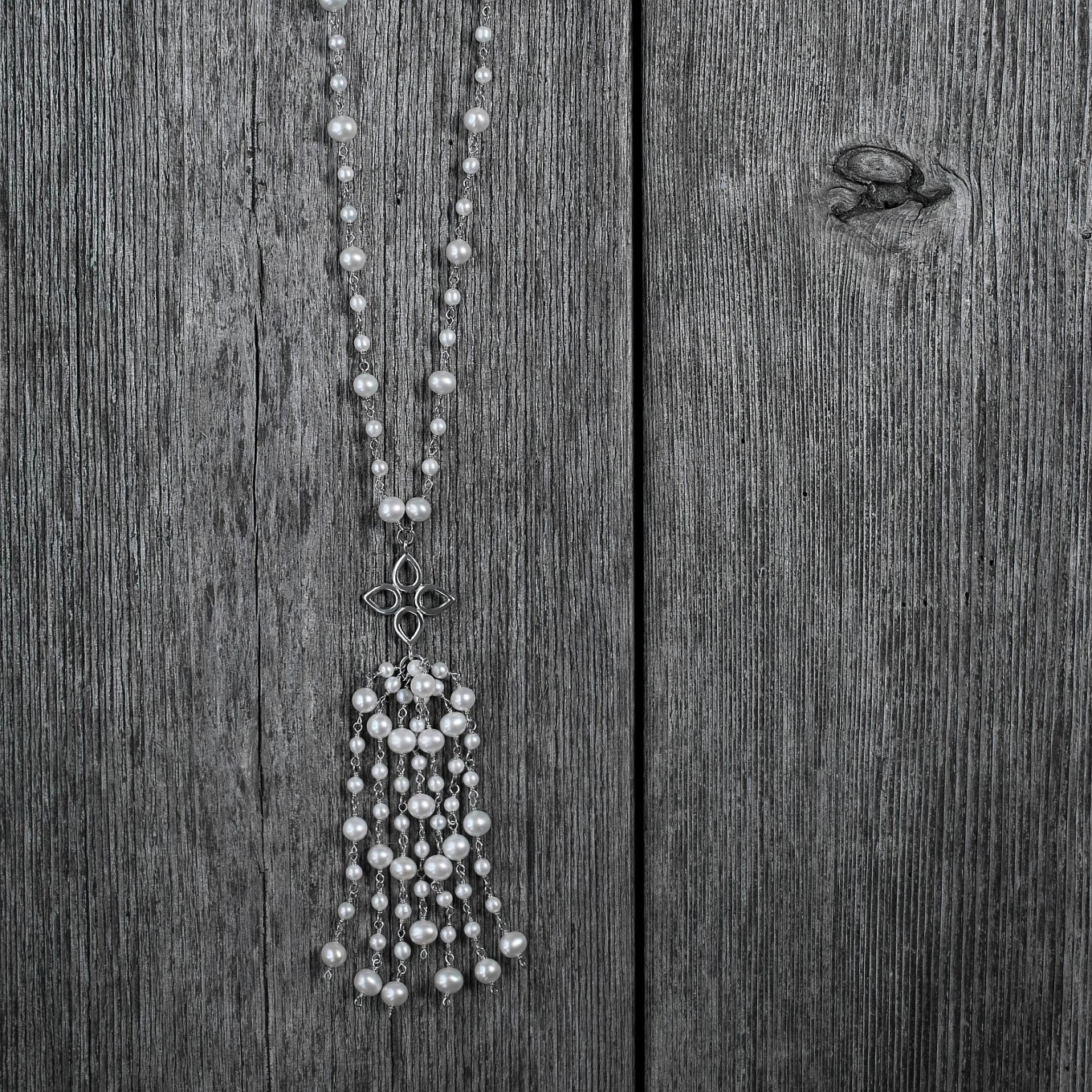 Freshwater pearl tassel necklace with Sevilla motifs in sterling silver