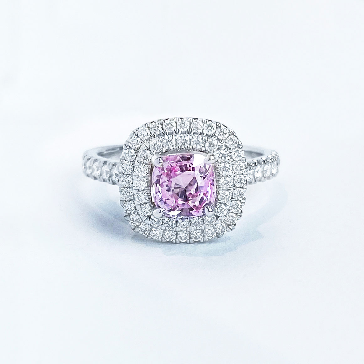 CUSHION SHAPED PINK SAPPHIRE AND DIAMOND FRAME RING IN WHITE GOLD